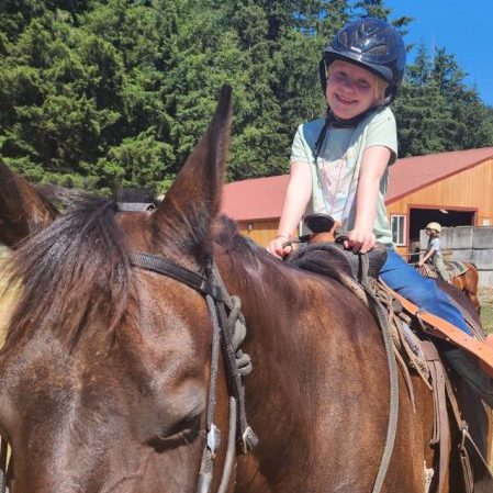 scout_horseback_ride Girl riding a horse.